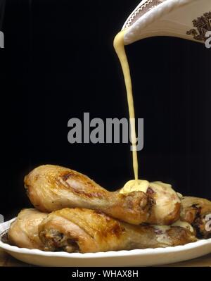 Grigliata di cosce di pollo con salsa di Gubbins Foto Stock