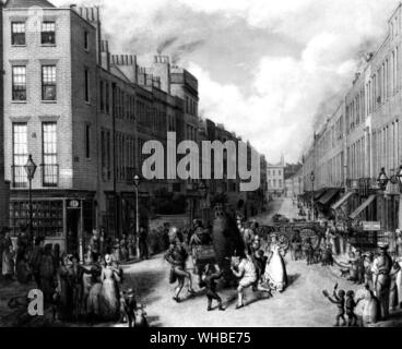 Tomaia Lisson Street. Paddington da Cappella San 1837-47. Mostra immagine: 'Spiange' giorno nella parte superiore Lisson Street, Paddington', tardi 1830s. London street con un martinetto in processione verde e un certo numero di boy spazzacamini che sono la raccolta di denaro. La gente guarda il divertimento da marciapiede. . Giorno di maggio le celebrazioni della Spazzacamini di Londra . Foto Stock