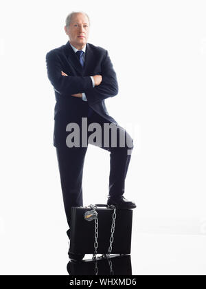 Imprenditore incatenati a valigetta Foto Stock