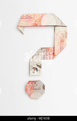 Punto interrogativo fatta di banconote piegato Foto Stock