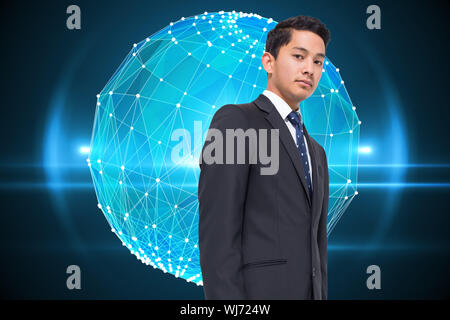 Immagine composita della sfera incandescente su sfondo nero Foto Stock