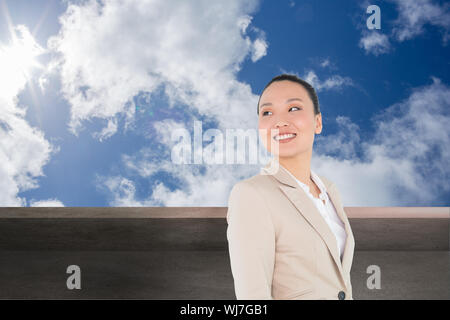 Immagine composita di sorridere asian imprenditrice Foto Stock