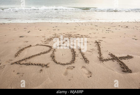 Iscrizione del 2014 sulla sabbia in spiaggia Foto Stock