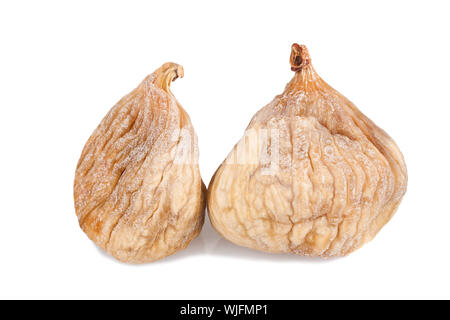 Due fichi secchi isolati su sfondo bianco Foto Stock
