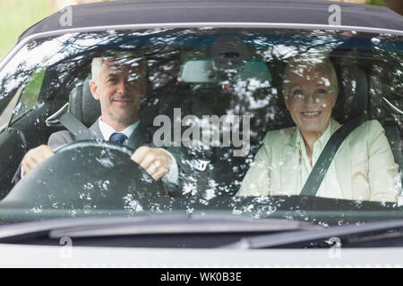 La gente di affari avente un tragitto in auto di classe Foto Stock