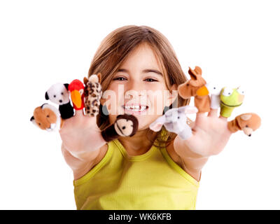 Carino e felice ragazza che gioca con il dito marionette Foto Stock