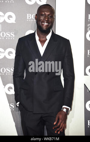 Stormzy arrivando al GQ Men of the Year Awards 2019 in associazione con Hugo Boss, tenutosi presso la Tate Modern di Londra. Foto Stock