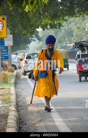 Sikh man walking on the road, New Delhi, India Stock Photo