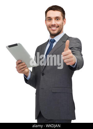 Buisnessman sorridente con tablet pc computer Foto Stock