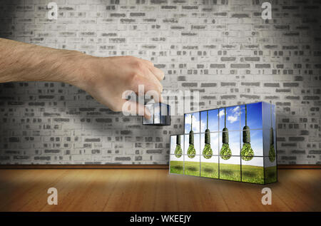 Lato della parete edilizia che mostra cinque lampadine appeso Foto Stock