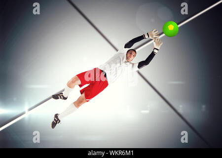 Il portiere in bianco il salto contro schermo futuristico con linee Foto Stock