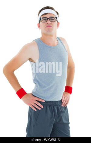 Geeky hipster in posa di sportswear su sfondo bianco Foto Stock