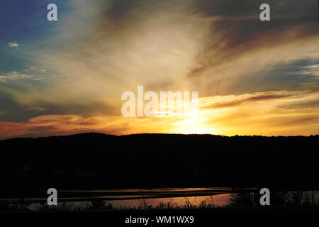Tramonto sulle colline Foto Stock