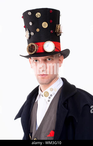 Ritratto di un mago con alto cappello, lungo cappotto e orologio i dettagli delle parti Foto Stock