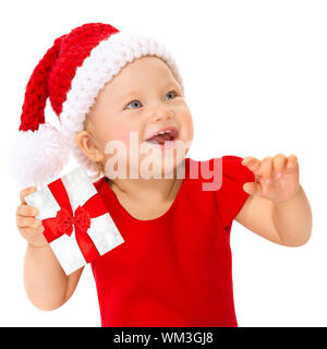 Bambino felice con un regalo di Natale Foto Stock