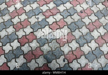 Progettato marciapiede vicino Shot, Piastrella o Pattern su strada Foto Stock