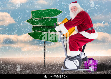 Santa utilizza un home trainer contro due tipi di segnaletica vuota Foto Stock