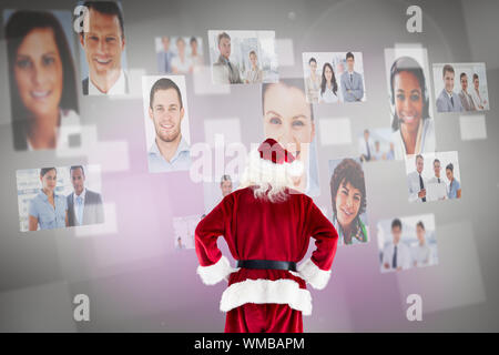 Immagine composita di santa claus contro il bollino grigio Foto Stock