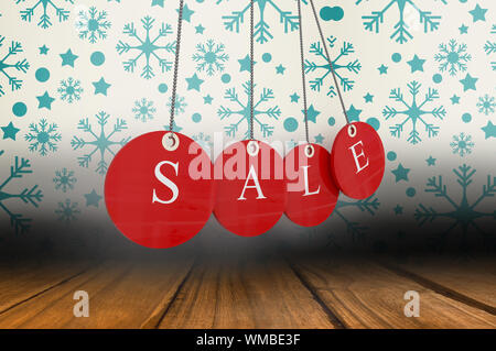 Red Tag vendita contro il simbolo del fiocco di neve lo sfondo su pannelli del pavimento Foto Stock