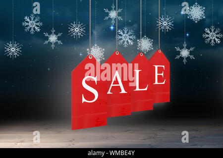 Red Tag vendita contro il simbolo del fiocco di neve lo sfondo su pannelli del pavimento Foto Stock
