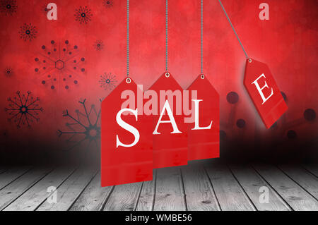 Red Tag vendita contro il simbolo del fiocco di neve lo sfondo su pannelli del pavimento Foto Stock