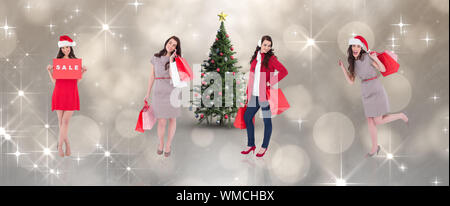 Immagine composita di diversi eleganti brunettes contro luce scintillante design su grigio Foto Stock