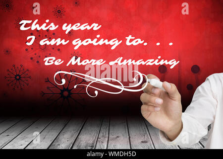 Imprenditore circa per scrivere qualcosa contro il simbolo del fiocco di neve lo sfondo su pannelli del pavimento Foto Stock