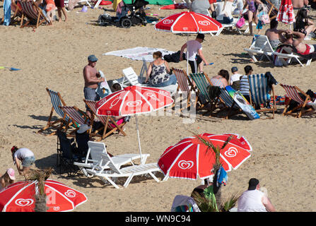 Clacton Regno Unito 23 agosto 2019 -: i turisti sulla spiaggia di Clacton Foto Stock