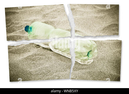 Fotografia strappata di un vuoto in plastica verde bottiglia abbandonati sulla spiaggia - il concetto di immagine Foto Stock