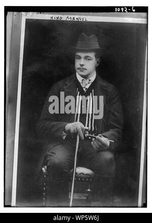 Re Manuel seduto con la canna da zucchero Foto Stock