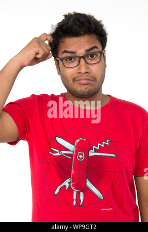 Giovane uomo cercando confuso Foto Stock