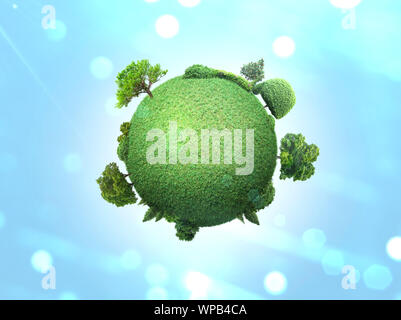 Piccolo pianeta verde con alberi Foto Stock