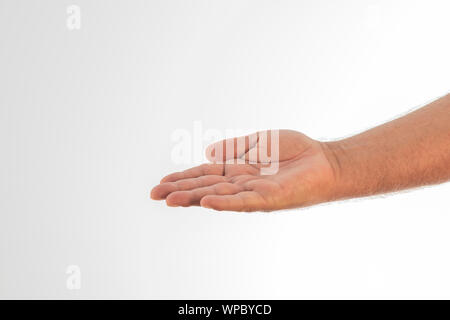 Una mano d'uomo disteso su uno sfondo bianco. Spazio per scrivere. Foto Stock