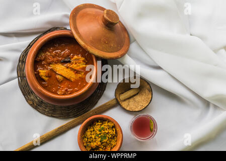 Frutti di mare di Goan curry servita tradizionalmente con succo kokum e gamberetti Foto Stock