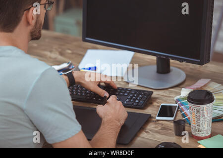Graphic designer small business home office concetto disegno Foto Stock
