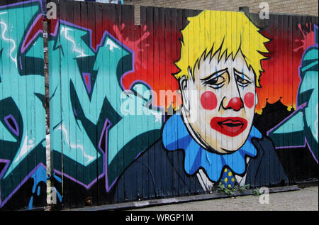 Brick Lane, London, Regno Unito - 10 Settembre 2019 : Boris Johnson raffigurato come un clown da artisti di graffiti nella zona est di Londra Foto Stock