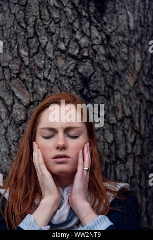 Donna con il mal di denti Foto Stock