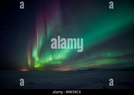 Northern lights aurora boreale in inverno Foto Stock