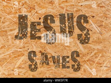 Gesù vive Gesù salva e il pesce icthus il segno per i credenti Foto Stock