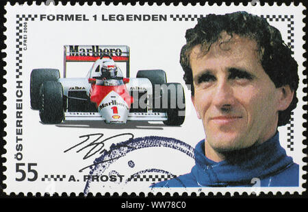 Racing driver Alain Prost sul francobollo Foto Stock