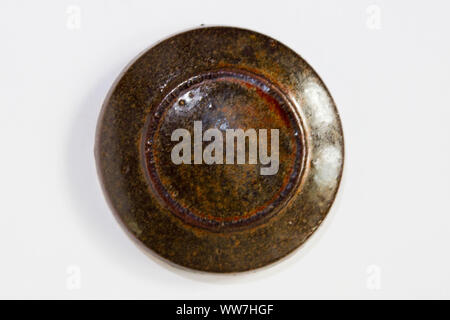 Round sonda di argilla marrone con smalto lucido Foto Stock
