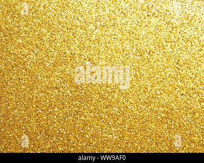 Golden scintillante sfondo usando come sfondo di festa con spazio per il testo o immagine Foto Stock