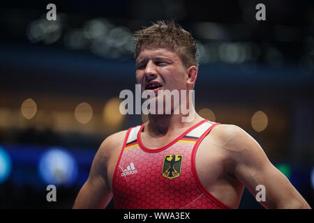 Nur Sultan, Kazakistan. Xiv Sep, 2019. Il wrestling/greco-romano : Campionato del mondo - 72 kg/greco-romana, uomini, qualifica. Michael Felix Widmayer dalla Germania reagisce. Credito: Kadir Caliskan/dpa/Alamy Live News Foto Stock