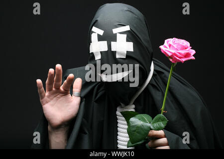 Mime nero con rose Foto Stock