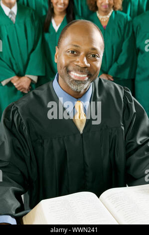 Predicatore sorridente Foto Stock