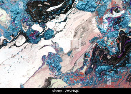 Spruzzi di vernice grafiti su strada con un sacco di colori vivaci e texture interessanti Foto Stock