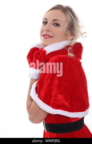 La bionda Miss Santa in un mini cape Foto Stock