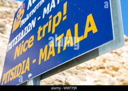 Matala, Pitsidia città firmare all'entrata della città Foto Stock