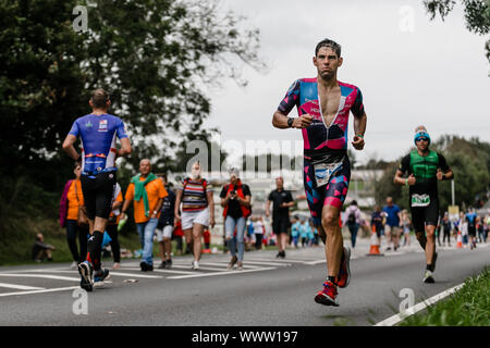 Atleta professionista, Joe Skipper durante Ironman Galles, Tenby, Galles, domenica 15 settembre 2019. Foto Stock