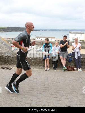 Gareth Thomas partecipa all'IRONMAN Galles 2019 Foto Stock